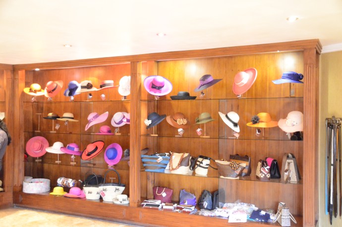 Women's hats and purses on display in showroom