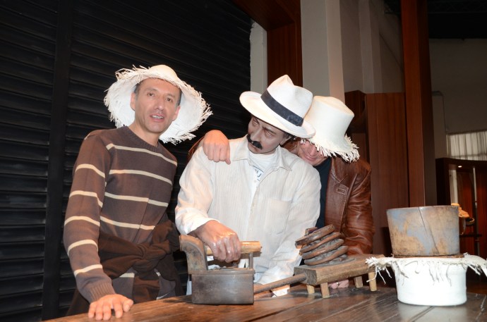 Faustio and Kent mug it up with a mannikin depicting the old way to shape hats 