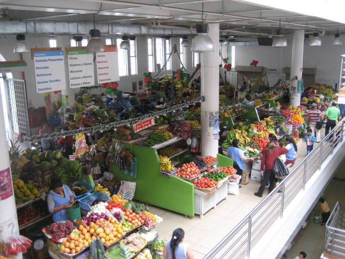 Fruits and vegetables for sale at the three level 9 de Octobre Market.