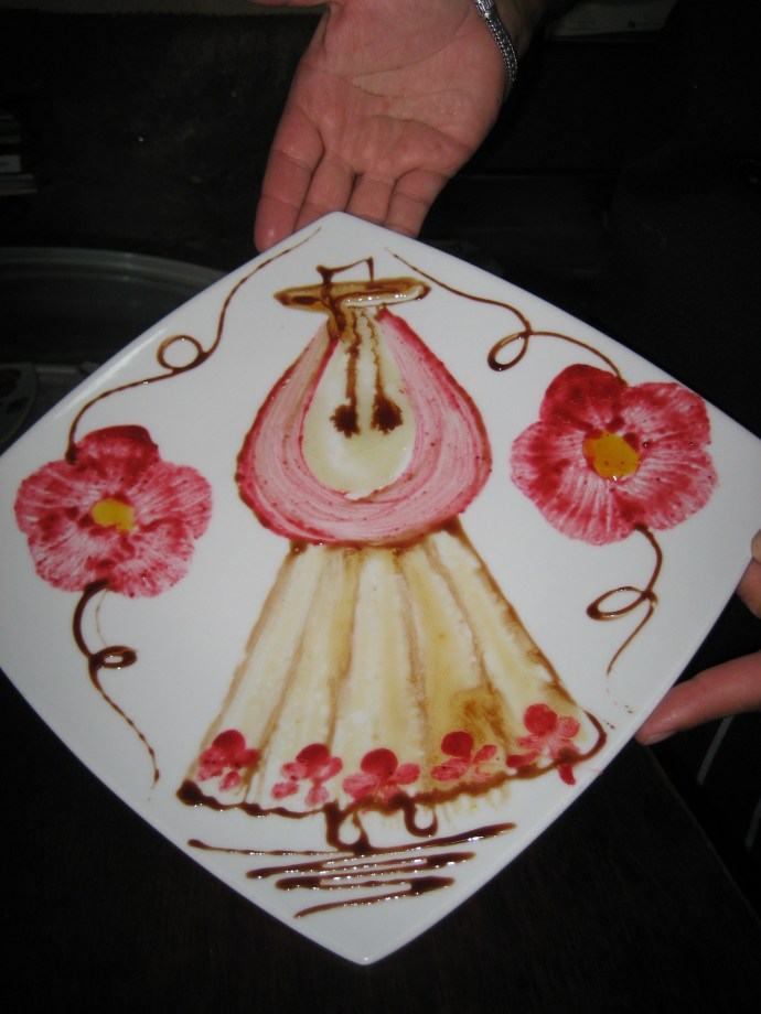 Step 14 -- Chef Juan Carlos holds up the finished product.