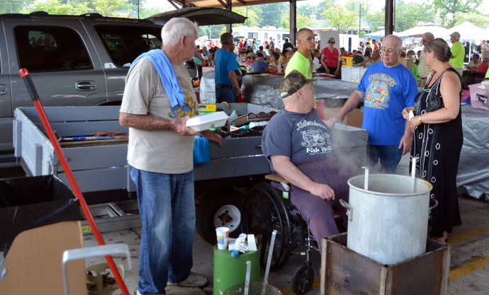 Donated fish on the first day of the tournament go into the blue trailer.